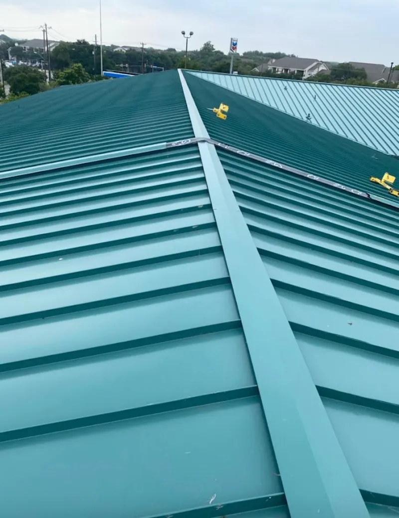 Green commercial metal roof ridge and valley for Metal Roof Repair in Randolph