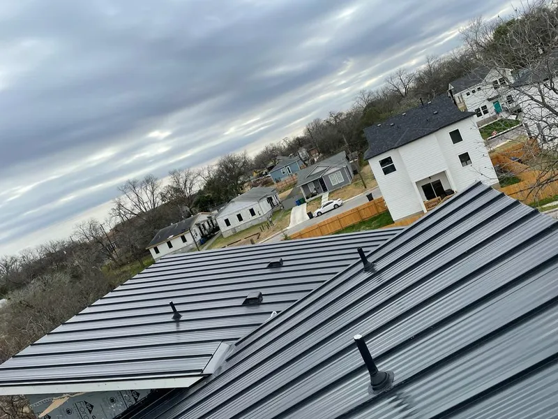 Standing seam metal roof panels with vents for Skylight Repair in Randolph